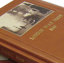 image of genuine leather tan coloured World War 2 diary with blitz photograph cover inlay